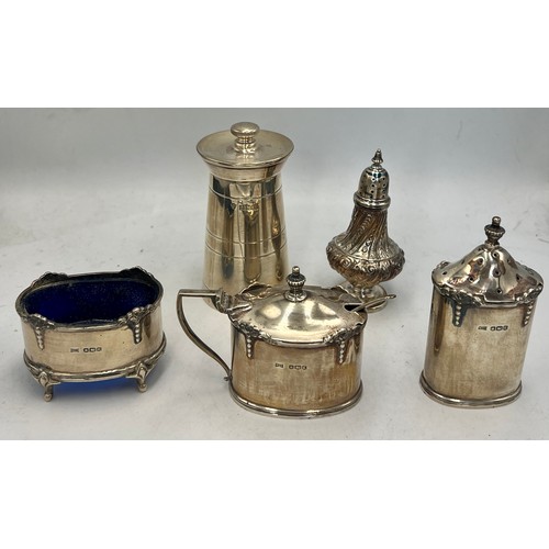 941 - Hallmarked silver to include three piece cruet Sheffield 1952, maker Walker & Hall, pepper pot Birmi... 