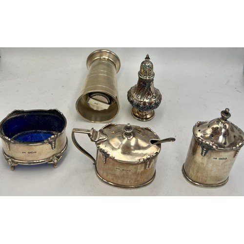 941 - Hallmarked silver to include three piece cruet Sheffield 1952, maker Walker & Hall, pepper pot Birmi... 