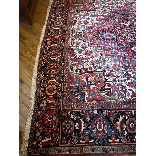 1283 - A very good quality red ground wool rug. 400 x 296cm without tassels.