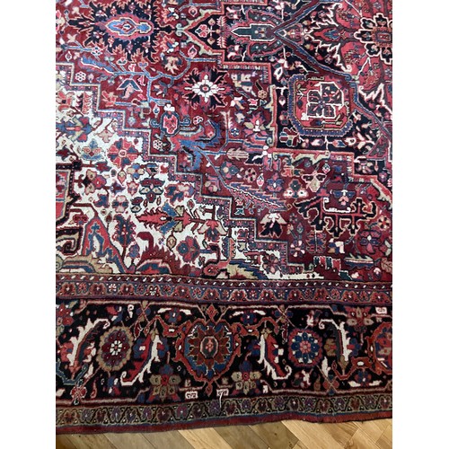 1283 - A very good quality red ground wool rug. 400 x 296cm without tassels.