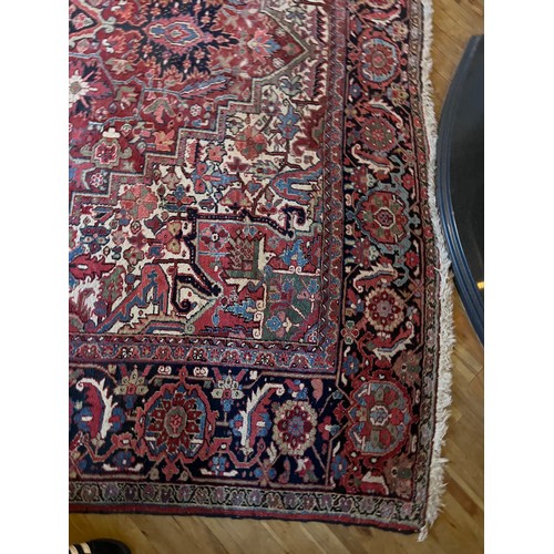 1283 - A very good quality red ground wool rug. 400 x 296cm without tassels.