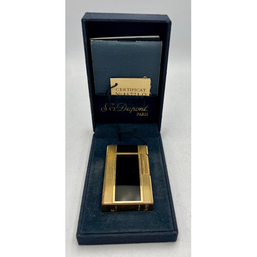 1355 - ST Dupont Paris gold plated and lacquer lighter with original box and paperwork.