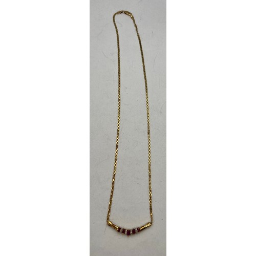 535 - A 10 carat gold chain necklace set with pink and clear stones. Weight 3.5gm.