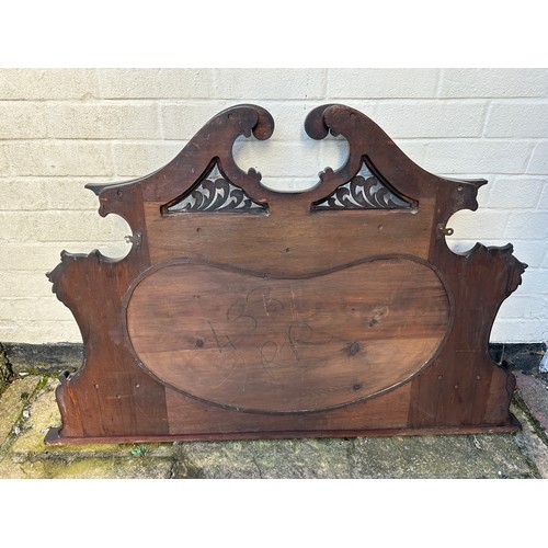 135 - An Edwardian mahogany and ebony over mantel mirror. 127cm w x 83cm h.