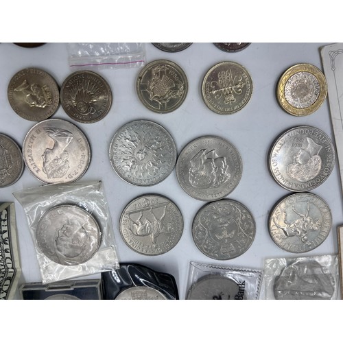 826 - Various coinage to include 20 x pounds/crowns, threepences, two pound coins , American dollars, a no... 