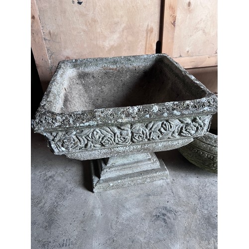 12 - Two reconstituted stone urns 53cm d x 43cm h marked Pan-Art together with a circular reconstituted s... 