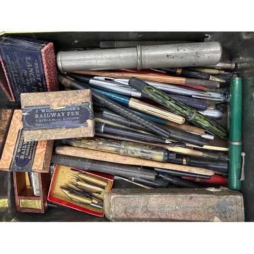 1352 - A miscellany to include a box of old pens to include 6 with 14ct nibs, boxes of nibs, 3 lead soldier... 