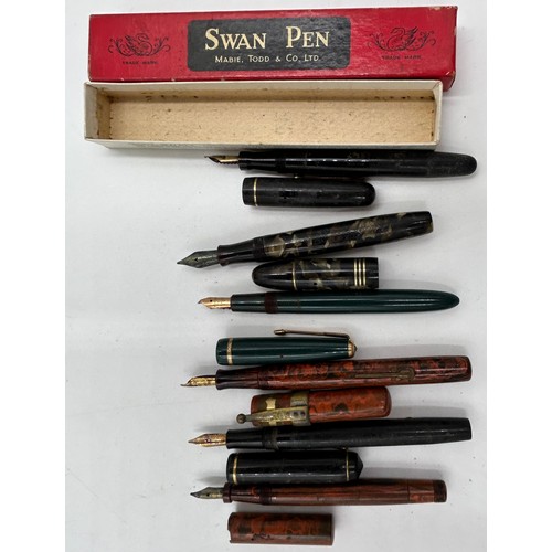 1352 - A miscellany to include a box of old pens to include 6 with 14ct nibs, boxes of nibs, 3 lead soldier... 