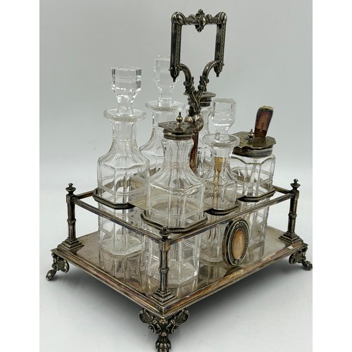 473 - A silver plated cruet set by Walker & Hall 220 x 170cm x 26cm h together with a pair of crystal  Vil... 