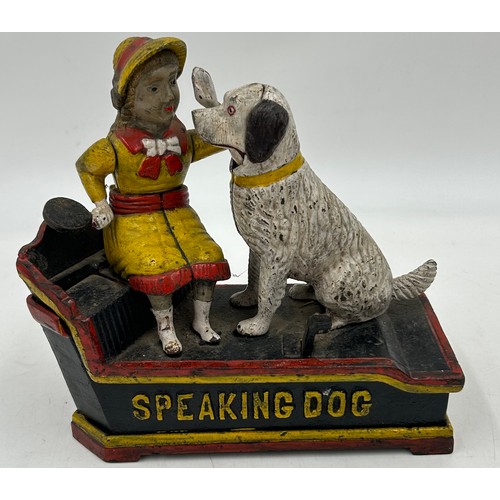 1361 - A cast iron money automated money box, Speaking Dog, 18cm w x 7cm d x 19cm h. Together with a 20thC ... 