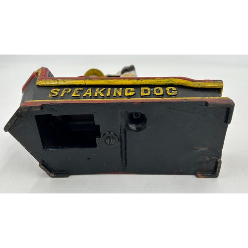 1361 - A cast iron money automated money box, Speaking Dog, 18cm w x 7cm d x 19cm h. Together with a 20thC ... 