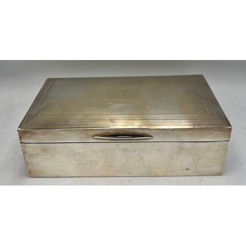 928 - A hallmarked silver cigarette box. 17cm x 8 cm x 5cm h. Birmingham 1939.