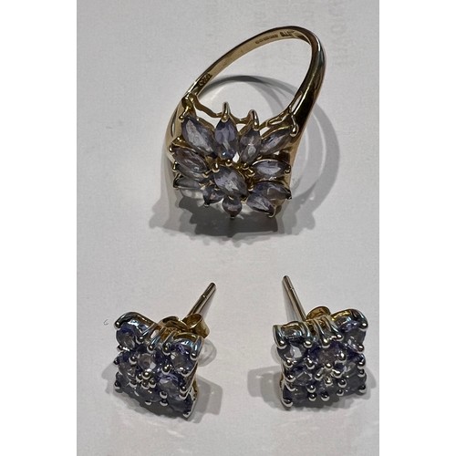 595 - A pair of tanzanite cluster earrings in 9 carat gold together with a tanzanite cluster ring in 9 car... 