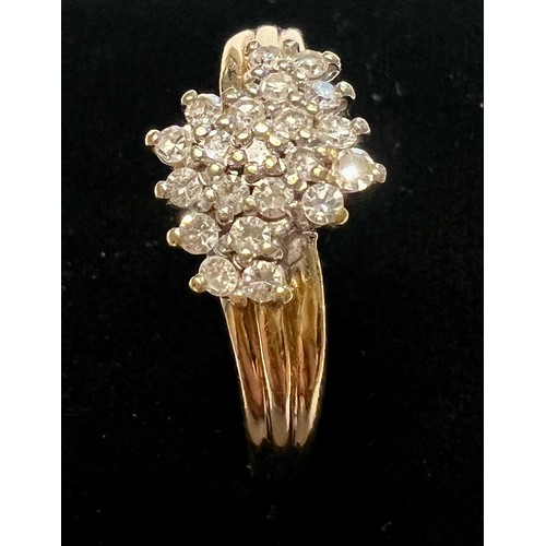 604 - An 18 carat gold ring set with multiple clear stones. Size O/P. Weight 3.5gm.