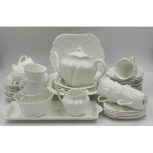 343 - Shelley white glazed porcelain tea service with two registration numbers 735121 and 272101 consistin... 