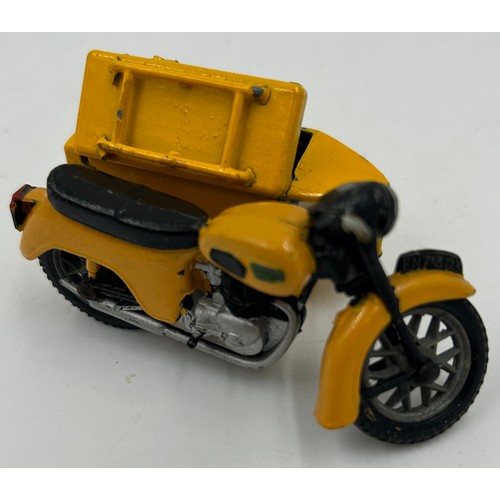 1329 - A Zebra Toys AA patrol motor bike along with two Burago racing cars scale 1/18 comprising of an Alfa... 