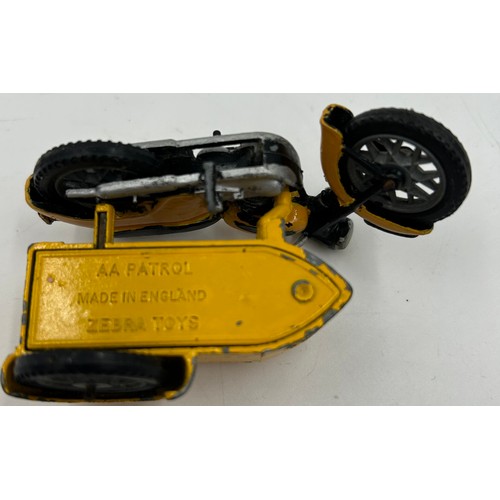 1329 - A Zebra Toys AA patrol motor bike along with two Burago racing cars scale 1/18 comprising of an Alfa... 