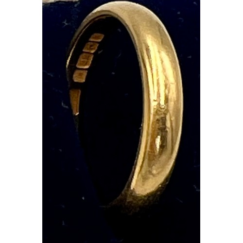 611 - A 22 carat gold wedding band, size S, weight 6.5gm.