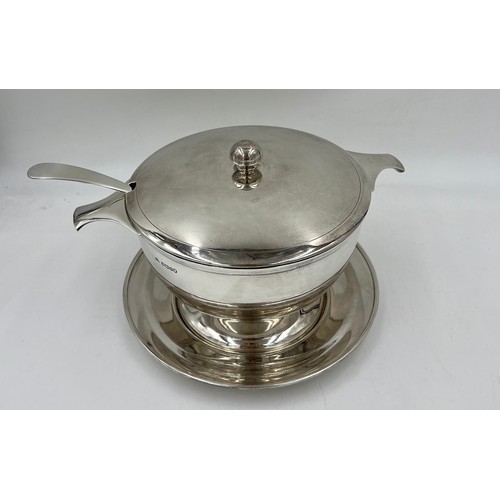 923 - A silver lidded tureen on stand with ladle, Sheffield 1935 with Jubilee mark, maker Viners Ltd. Ture... 