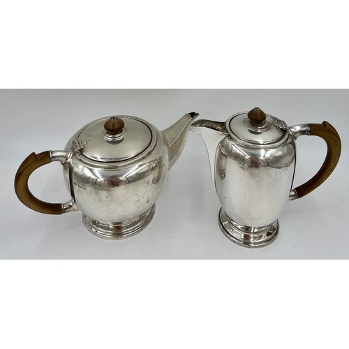 926 - Silver tea and coffee pots with wooden handles and knops. Sheffield 1945, maker Francis Cobb & Co. T... 