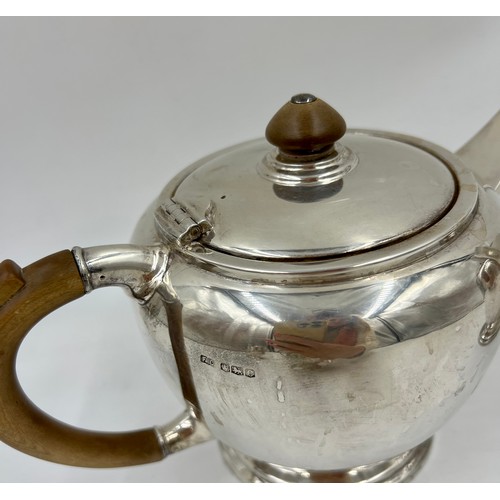 926 - Silver tea and coffee pots with wooden handles and knops. Sheffield 1945, maker Francis Cobb & Co. T... 