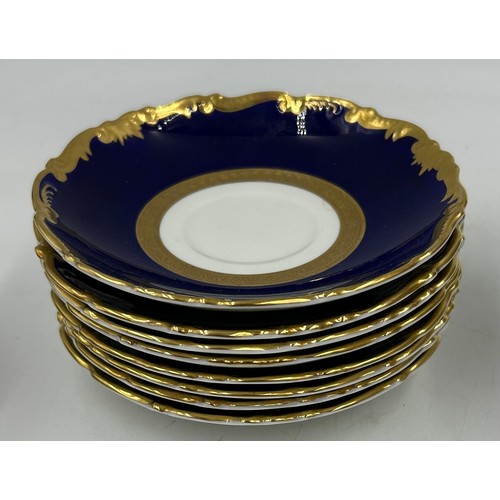 344 - A quantity of Coalport gilt and cobalt porcelain plates etc, some marked 'Cellini' others with blue ... 