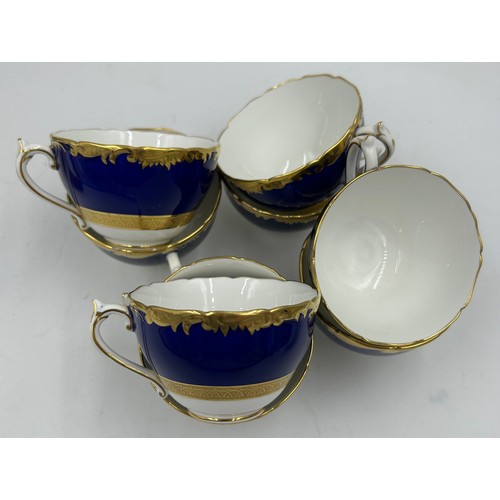 344 - A quantity of Coalport gilt and cobalt porcelain plates etc, some marked 'Cellini' others with blue ... 