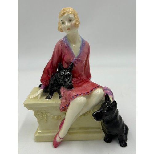 340 - A Royal Doulton figure, Scotties HN1281. 14.5cm h.