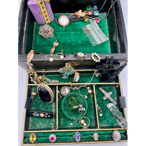 579 - A 19thC leather covered jewellery box and contents of 19th and early 20thC jewellery to include 9 ca... 