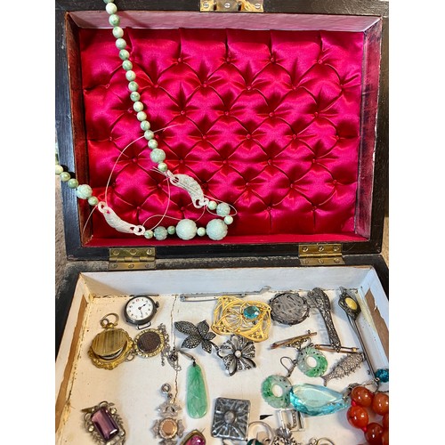 580 - A 19thC walnut jewellery box and contents to include two 9 carat gold bar brooches, silver cased wat... 