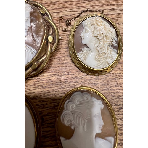 584 - Four various cameo brooches including three shell cameo, two 19thC. One simulated shell. Largest 6cm... 