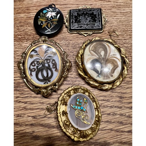 587 - Four 19thC brooches and a pietra dura pendant. Two mourning brooches, one chalcedony with turquoise ... 