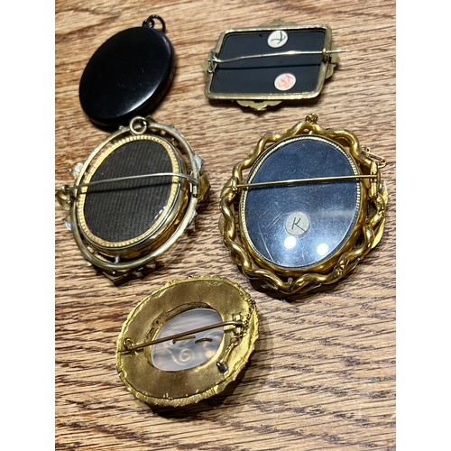 587 - Four 19thC brooches and a pietra dura pendant. Two mourning brooches, one chalcedony with turquoise ... 