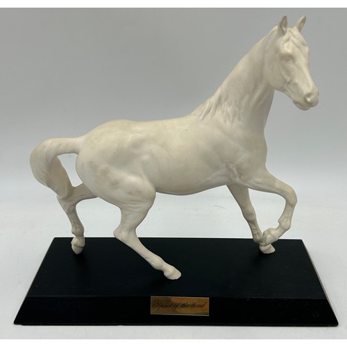 438 - Four Beswick Horses Connoisseur Series - Arab, Spirit of the Wind, Black Beauty and a bay all on woo... 