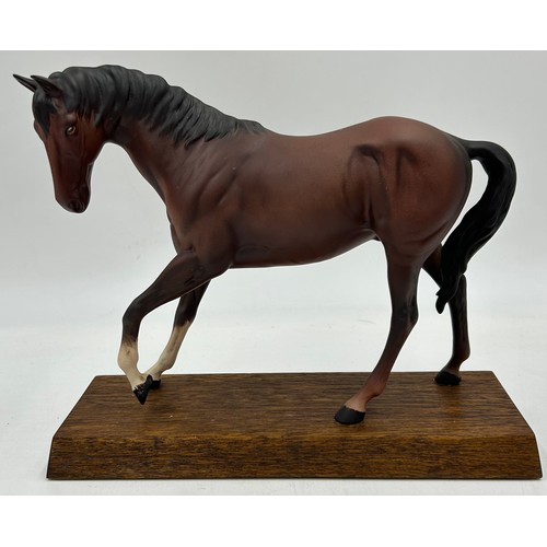 438 - Four Beswick Horses Connoisseur Series - Arab, Spirit of the Wind, Black Beauty and a bay all on woo... 