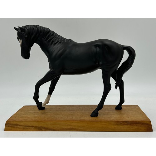 438 - Four Beswick Horses Connoisseur Series - Arab, Spirit of the Wind, Black Beauty and a bay all on woo... 