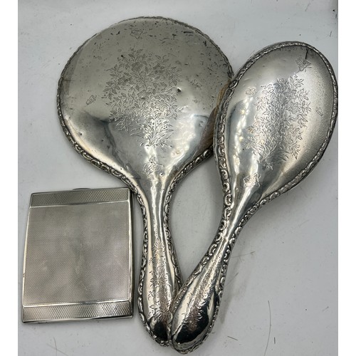 853 - Silver backed mirror and hairbrush, Chester 1908 together with a silver cigarette case Chester 1934,... 