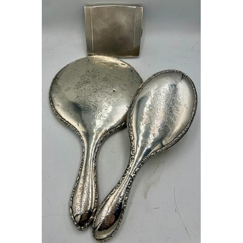 853 - Silver backed mirror and hairbrush, Chester 1908 together with a silver cigarette case Chester 1934,... 