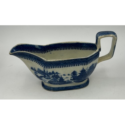 173 - A group of late 18th century and early 19th century blue and white transfer-printed sauce boats, c. ... 