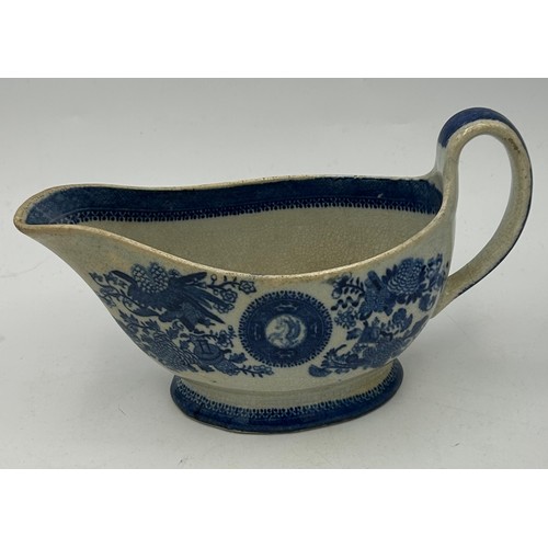 173 - A group of late 18th century and early 19th century blue and white transfer-printed sauce boats, c. ... 