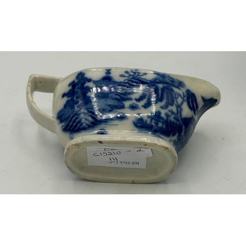 173 - A group of late 18th century and early 19th century blue and white transfer-printed sauce boats, c. ... 