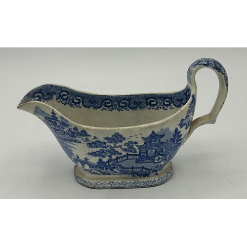 173 - A group of late 18th century and early 19th century blue and white transfer-printed sauce boats, c. ... 