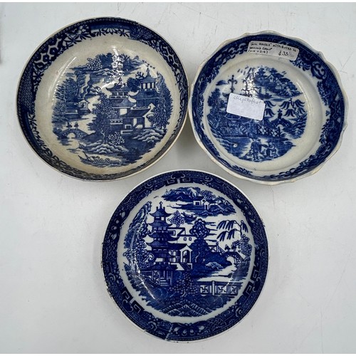 188 - A large group of early 19th century blue and white transfer-printed saucers and larger saucer dishes... 