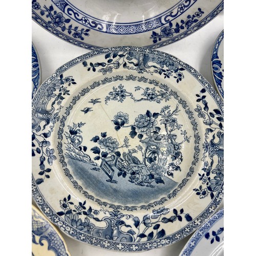 199 - A group of early 19th century blue and white transfer-printed plates, some Spode, as Chinese replace... 