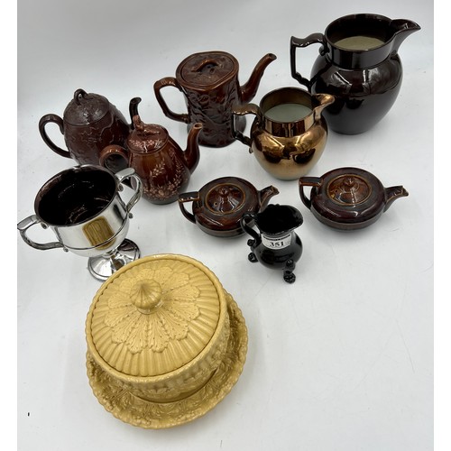 200 - A group of mainly early 19th century brown glazed and other similar wares, c. 1820-40. To include: f... 