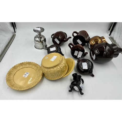 200 - A group of mainly early 19th century brown glazed and other similar wares, c. 1820-40. To include: f... 