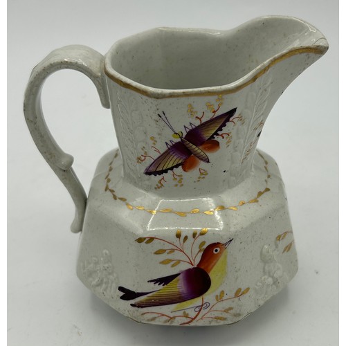 201 - A group of mainly Spode early 19th century jugs, c. 1820. To include a moulded jug with painted bird... 