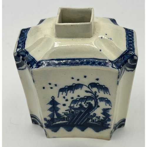 216 - Two early 19th century pearlware tea caddies, hand-painted in blue, one with floral decoration and o... 