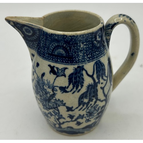 219 - A group of early 19th century blue and white transfer-printed cream jugs, c. 1800. To include: Spode... 