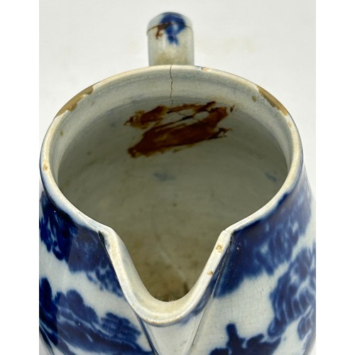 219 - A group of early 19th century blue and white transfer-printed cream jugs, c. 1800. To include: Spode... 